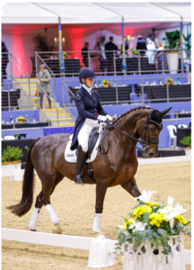 Georgia riding at a dressage comp